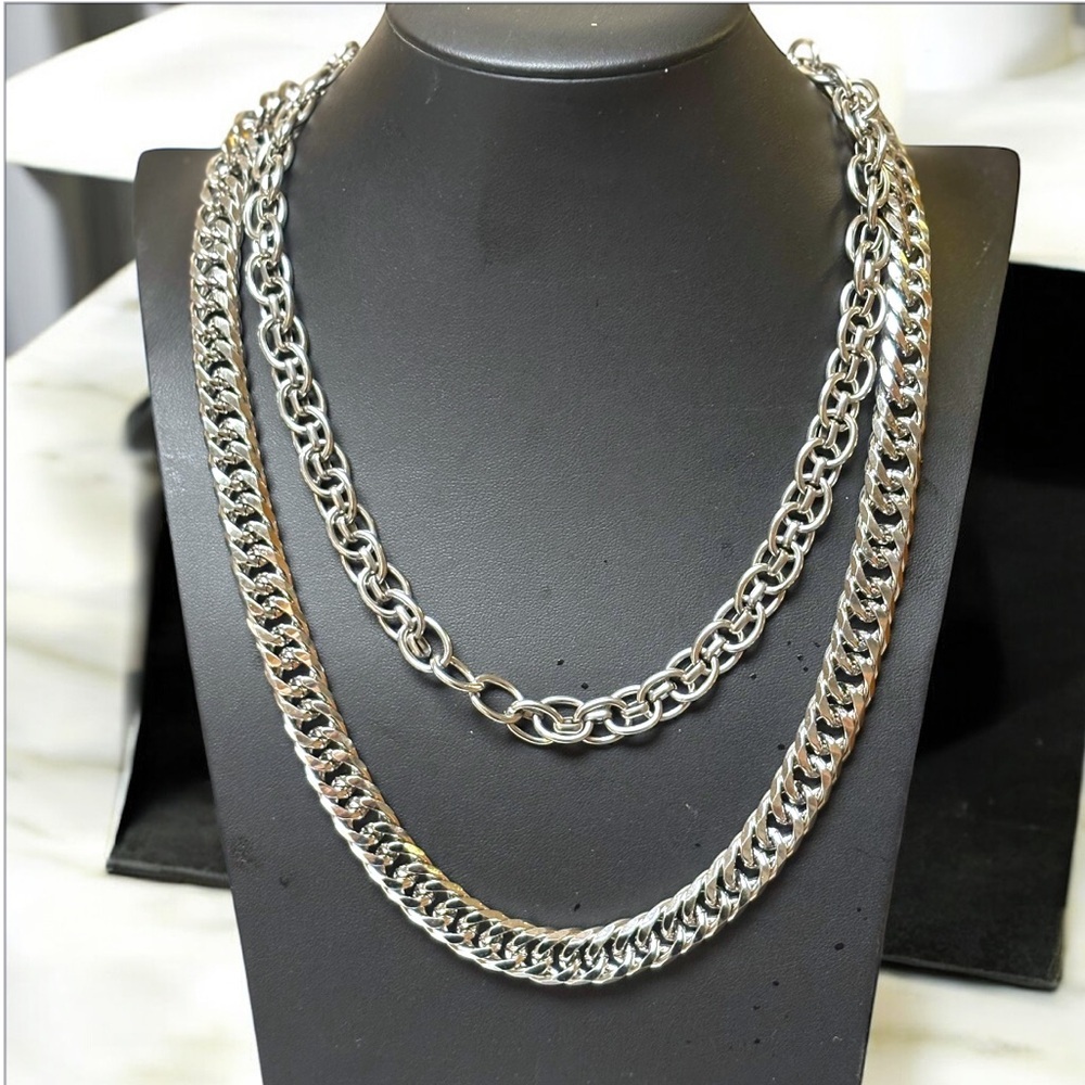 Stainless steel two piece Cuban chain-link necklace set.